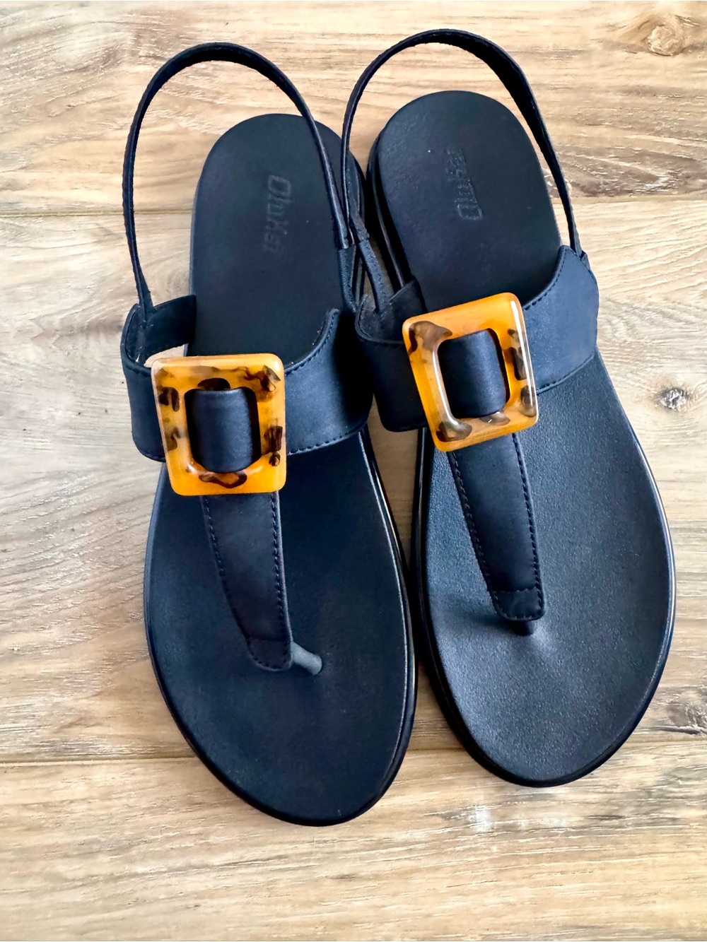 OluKai Black T-Strap Sandals with Tortoiseshell Buckle